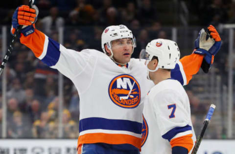 BOSTON, MASSACHUSETTS – DECEMBER 19: Johnny Boychuk #55 of the New York Islanders celebrates with Jordan Eberle #7 after scoring a goal against the Boston Bruins during the second period at TD Garden on December 19, 2019 in Boston, Massachusetts. (Photo by Maddie Meyer/Getty Images)