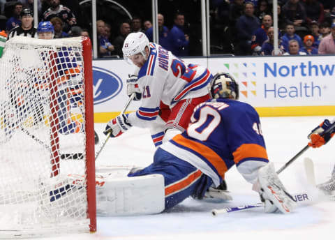UNIONDALE, NEW YORK – JANUARY 16: Semyon Varlamov #40 of the New York Islanders makes a first period save on Brett Howden #21 of the New York Rangers at NYCB Live’s Nassau Coliseum on January 16, 2020 in Uniondale, New York. (Photo by Bruce Bennett/Getty Images)