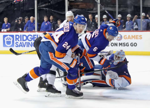 NEW YORK, NEW YORK – FEBRUARY 06: Scott Mayfield #24, Ryan Pulock #6 and Thomas Greiss #1 of the New York Islanders defend the net against the Los Angeles Kings during the third period at the Barclays Center on February 06, 2020 in the Brooklyn borough of New York City. The Islanders defeated the Kings 5-3. (Photo by Bruce Bennett/Getty Images)