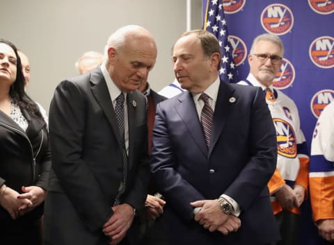 UNIONDALE, NEW YORK – FEBRUARY 29: New York Islander GM Lou Lamoriello chats with NHL commissioner Gary Bettman at NYCB Live’s Nassau Coliseum on February 29, 2020 in Uniondale, New York. (Photo by Bruce Bennett/Getty Images)
