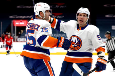 Cal Clutterbuck #15 with Casey Cizikas #53 of the New York Islanders. (Photo by Rob Carr/Getty Images)