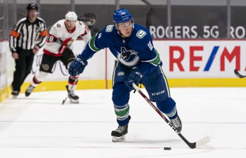 VANCOUVER, BC – JANUARY 27: Jake Virtanen #18 of the Vancouver Canucks skates with the puck during NHL hockey action against the Ottawa Senators at Rogers Arena on January 27, 2021 in Vancouver, Canada. (Photo by Rich Lam/Getty Images)