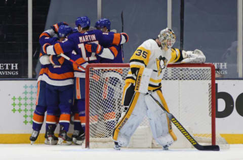 The New York Islanders fourth line celebrate a goal. (Photo by Bruce Bennett/Getty Images)