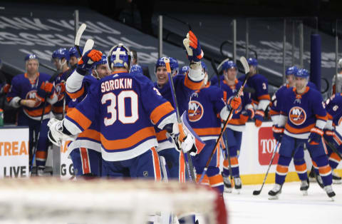 Ilya Sorokin #30 and the New York Islanders celebrate the shootout win over the Philadelphia Flyers. (Photo by Bruce Bennett/Getty Images)