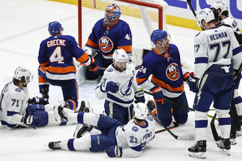 Brayden Point #21 of the Tampa Bay Lightning is congratulated by Steven Stamkos #91 after scoring a goal past Semyon Varlamov #40 of the New York Islanders. (Photo by Elsa/Getty Images)