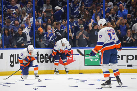 Mathew Barzal #13, Ryan Pulock #6 and Matt Martin #17 of the New York Islanders. (Photo by Bruce Bennett/Getty Images)