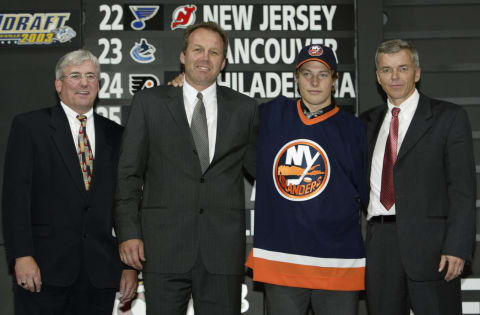 NASHVILLE, TN – JUNE 21: (L to R) Doug Gibson, first round draft pick (#15 overall) Robert Nilsson, Tony Feltrin and Anders Kallur of the New York Islanders pose for a portrait on stage during the 2003 NHL Entry Draft at the Gaylord Entertainment Center on June 21, 2003 in Nashville, Tennessee. (Photo by Elsa/Getty Images/NHLI)