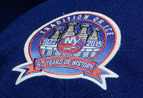 UNIONDALE, NY – SEPTEMBER 24: The New York Islanders jerseys bear a patch in honor of their last season at the Nassau Veterans Memorial Coliseum during the game against the Carolina Hurricanes on September 24, 2014 in Uniondale, New York. (Photo by Bruce Bennett/Getty Images)