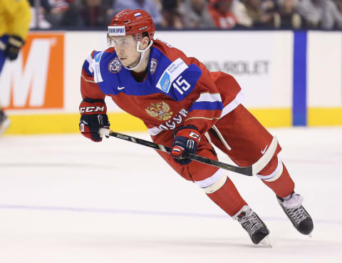 TORONTO, ON – JANUARY 4: Anatoli Golyshev #15 of Team Russia skates against Team Sweden during a semi-final game in the 2015 IIHF World Junior Hockey Championship at the Air Canada Centre on January 4, 2015 in Toronto, Ontario, Canada. Team Russia defeated Team Sweden 4-2 to advance to the gold medal game against Canada. (Photo by Claus Andersen/Getty Images)