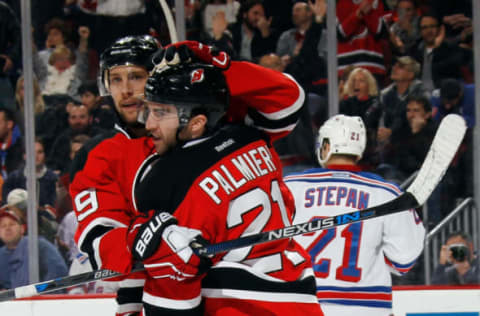 Travis Zajac #19 and Kyle Palmieri #21 of the New York Islanders. (Photo by Bruce Bennett/Getty Images)