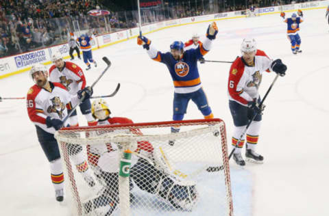 NEW YORK, NY – MARCH 14: Nikolay Kulemin #86 of the New York Islanders celebrates the game winning goal by Cal Clutterbuck #15 against Roberto Luongo #1 of the Florida Panthers at the Barclays Center on March 14, 2016 in the Brooklyn borough of New York City. The Islanders defeated the Panthers 3-2. (Photo by Bruce Bennett/Getty Images)