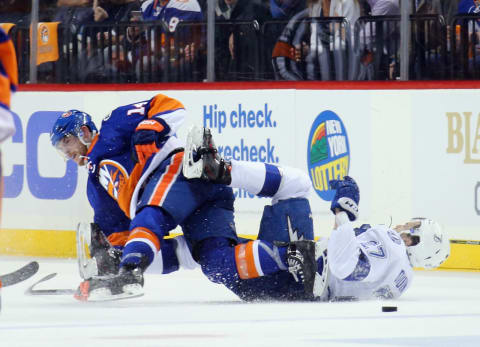 NEW YORK, NY – MAY 03: Thomas Hickey #14 of the New York Islanders checks Jonathan Drouin #27 of the Tampa Bay Lightning during the second period in Game Three of the Eastern Conference Second Round during the 2016 NHL Stanley Cup Playoffs at the Barclays Center on May 03, 2016 in the Brooklyn borough of New York City. (Photo by Bruce Bennett/Getty Images)