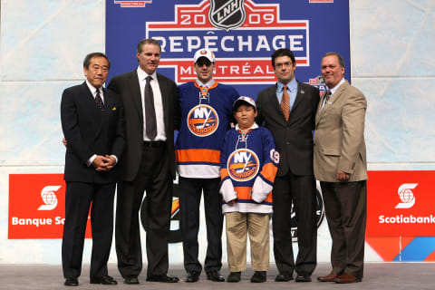 MONTREAL, QC – JUNE 26: (L-R) Team owner Charles Wang, General Manager Garth Snow, John Tavares, Assistant General Manager/Director of Amateur Scouting Ryan Jankowski and Pro Scout Mario Saraceno of the New Islanders pose on stage after the Islanders drafted Tavares #1 overall during the 2009 NHL Entry Draft by the New York Islander at the Bell Centre on June 26, 2009 in Montreal, Quebec, Canada. (Photo by Bruce Bennett/Getty Images)