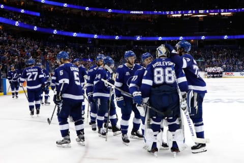 The Tampa Bay Lightning react after being defeated by the Washington Capitals in Game Seven of the Eastern Conference Finals during the 2018 NHL Stanley Cup Playoffs (Photo by Mike Carlson/Getty Images)