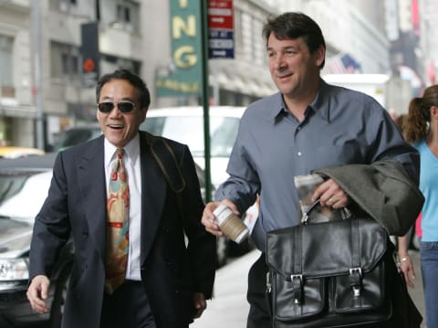 NEW YORK – APRIL 20: Charles Wang (L), owner of the New York Islanders and General Manager Mike Milbury (Photo by Bruce Bennett/Getty Images)