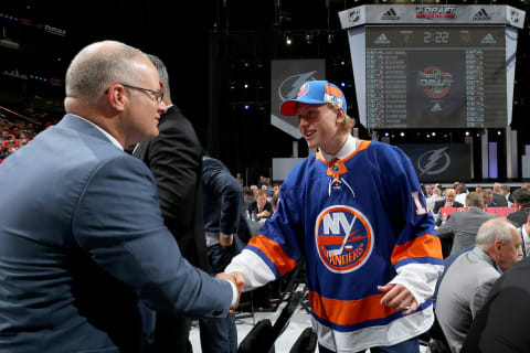 CHICAGO, IL – JUNE 24: Robin Salo meets with executives after being selected 46th overall by the New York Islanders during the 2017 NHL Draft at the United Center on June 24, 2017 in Chicago, Illinois. (Photo by Bruce Bennett/Getty Images)