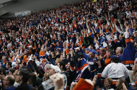 UNIONDALE, NY – APRIL 11: The New York Islanders fans chant their signature “Yes, Yes, Yes” following a goal by Kyle Okposo #21 against the Columbus Blue Jackets at the Nassau Veterans Memorial Coliseum on April 11, 2015 in Uniondale, New York. This is the last regular season game to be played in the building as it stands now. The team will relocate to the Barclay’s Center in the Brooklyn borough of New York City starting in the 2015-16 season. The Blue Jackets defeated the Islanders 5-4 in the shootout. (Photo by Bruce Bennett/Getty Images)