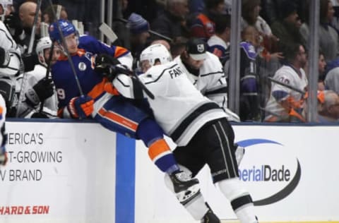 UNIONDALE, NEW YORK – FEBRUARY 02: Oscar Fantenberg #7 of the Los Angeles Kings checks Brock Nelson #29 of the New York Islanders into the bench during the third period at NYCB Live’s Nassau Coliseum on February 02, 2019 in Uniondale, New York. The Islanders defeated the Kings 4-2.(Photo by Bruce Bennett/Getty Images)