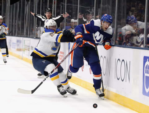 UNIONDALE, NEW YORK – OCTOBER 14: Derick Brassard #10 of the New York Islanders is checked by Vince Dunn #29 of the St. Louis Blues during the second period at NYCB Live’s Nassau Coliseum on October 14, 2019 in Uniondale, New York. (Photo by Bruce Bennett/Getty Images)