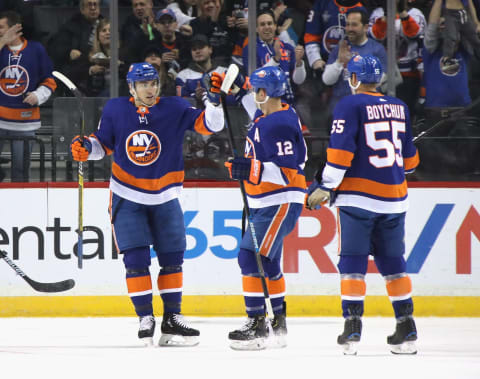 NEW YORK, NEW YORK – FEBRUARY 01: Michael Dal Colle #28 of the New York Islanders (L) celebrates his first period goal against the Vancouver Canucks at the Barclays Center on February 01, 2020 in the Brooklyn borough of New York City. (Photo by Bruce Bennett/Getty Images)