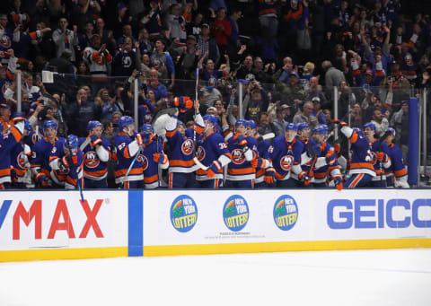 UNIONDALE, NEW YORK – OCTOBER 12: The New York Islanders celebrate a 3-2 shoot-out win against the Florida Panthers at NYCB Live’s Nassau Coliseum on October 12, 2019 in Uniondale, New York. (Photo by Bruce Bennett/Getty Images)