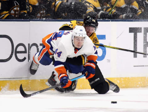 UNIONDALE, NEW YORK – FEBRUARY 29: Jean-Gabriel Pageau #44 of the New York Islanders is checked by Joakim Nordstrom #20 of the Boston Bruins during the first period at NYCB Live’s Nassau Coliseum on February 29, 2020 in Uniondale, New York. The Bruins shut-out the Islanders 4-0. (Photo by Bruce Bennett/Getty Images)