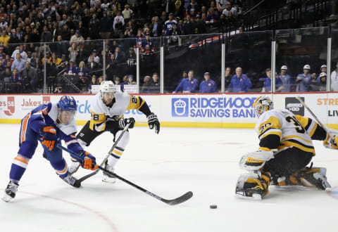 NEW YORK, NEW YORK – NOVEMBER 21: Brock Nelson #29 of the New York Islanders scores the game winning goal at 4:16 of overtime against the Pittsburgh Penguins at the Barclays Center on November 21, 2019 in the Brooklyn borough of New York City. The Islanders defeated the Penguins 4-3 in overtime and with the victory, (the Islanders are 15-0-1 since Oct. 12) extended their point streak to a franchise-record 16 games. (Photo by Bruce Bennett/Getty Images)