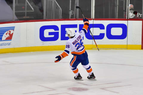 Mar 13, 2021; Newark, New Jersey, USA; New York Islanders right wing Oliver Wahlstrom (26) celebrates after scoring a goal against the New Jersey Devils during the first period at Prudential Center. Mandatory Credit: Catalina Fragoso-USA TODAY Sports