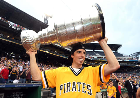 Jun 13, 2017; Pittsburgh, PA, USA; Pittsburgh Penguins goalie Marc-Andre Fleury (29) carries the Stanley Cup onto the field before the Pittsburgh Pirates play the Colorado Rockies at PNC Park. Mandatory Credit: Charles LeClaire-USA TODAY Sports