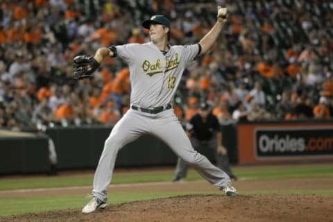 Aug 14, 2015; Baltimore, MD, USA; Oakland Athletics relief pitcher Drew Pomeranz (13) pitches during the thirteenth inning against the Baltimore Orioles at Oriole Park at Camden Yards. Baltimore Orioles defeated Oakland Athletics 8-6 in the thirteenth inning. Mandatory Credit: Tommy Gilligan-USA TODAY Sports