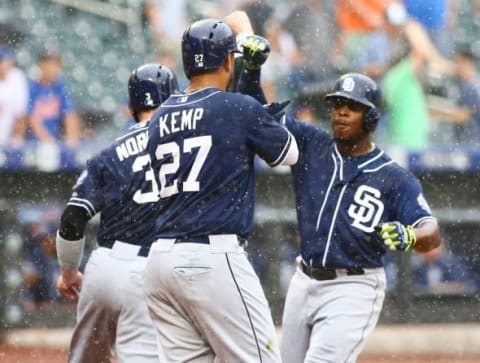 Jul 30, 2015; New York City, NY, USA; San Diego Padres left fielder left fielder Justin Uptons (R) celebrates after hitting a three run home run in the ninth inning against the New York Mets at Citi Field. Mandatory Credit: Andy Marlin-USA TODAY Sports