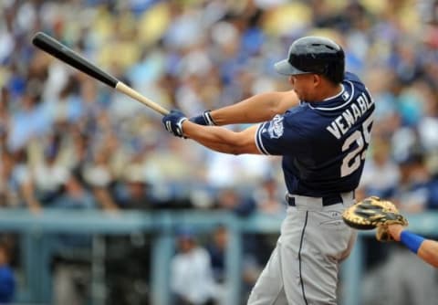 May 24, 2015; Los Angeles, CA, USA; San Diego Padres center fielder Will Venable (25) hits a single in the second inning against the Los Angeles Dodgers at Dodger Stadium. Mandatory Credit: Gary A. Vasquez-USA TODAY Sports