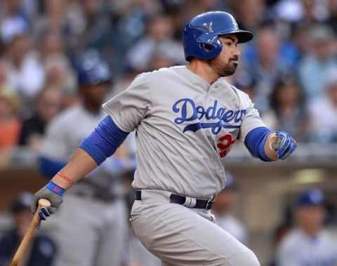 Apr 4, 2016; San Diego, CA, USA; Los Angeles Dodgers first baseman Adrian Gonzalez (23) follows through during the sixth inning against the San Diego Padres at Petco Park. Mandatory Credit: Jake Roth-USA TODAY Sports