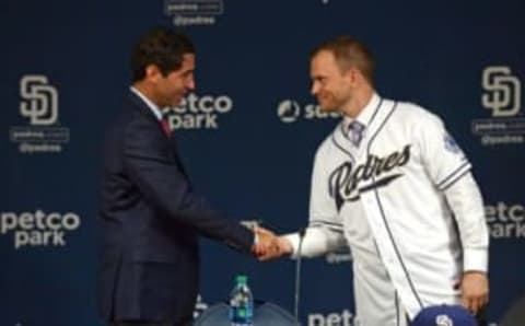 Oct 29, 2015; San Deigo, CA, USA; San Diego Padres new manager Andy Green (right) shakes hands with general manager A.J. Preller looks on during a press conference at Petco Park. Mandatory Credit: Jake Roth-USA TODAY Sports