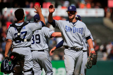 SAN FRANCISCO, CALIFORNIA – APRIL 10: Wil Myers #4 celebrates with Francisco Mejia #27 of the San Diego Padres after beating the San Francisco Giants at Oracle Park on April 10, 2019 in San Francisco, California. (Photo by Daniel Shirey/Getty Images)