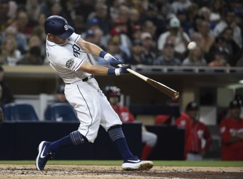 SAN DIEGO, CA – JUNE 8: Ian  Kinsler #3 of the San Diego Padres hits a double during the fourth inning of a baseball game against the Washington Nationals at Petco Park June 8, 2019 in San Diego, California. (Photo by Denis Poroy/Getty Images)