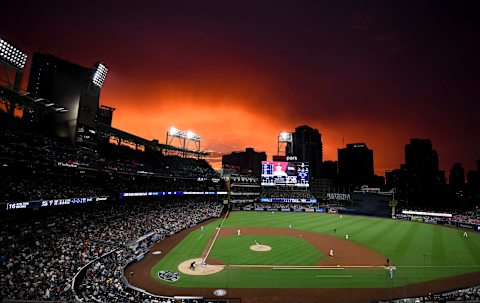 SAN DIEGO, CA – JUNE 29: The sun sets as Chris Paddack #59 of the San Diego Padres pitches to Kolten Wong #16 of the St. Louis Cardinals during the third inning of a baseball game at Petco Park June 29, 2019 in San Diego, California. (Photo by Denis Poroy/Getty Images)