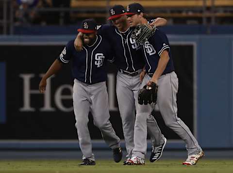 Manuel Margot #7, Hunter Renfroe #10 and Wil Myers #4 of the San Diego Padres. (Photo by Victor Decolongon/Getty Images)