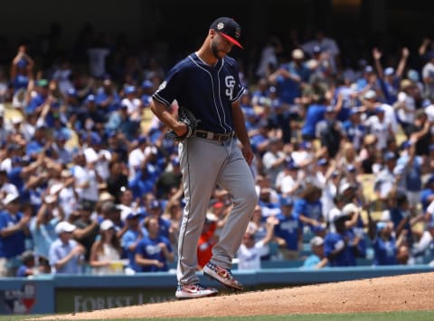 LOS ANGELES, CALIFORNIA – JULY 07: Pitcher Joey Lucchesi #37 of the San Diego Padres reacts after giving up a solo home run in the second inning during the MLB game against the Los Angeles Dodgers at Dodger Stadium on July 07, 2019 in Los Angeles, California. (Photo by Victor Decolongon/Getty Images)