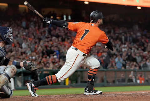 SAN FRANCISCO, CA – AUGUST 30: Kevin  Pillar #1 of the San Francisco Giants hits a sacrifice fly scoring Evan Longoria against the San Diego Padres in the bottom of the seventh inning at Oracle Park on August 30, 2019 in San Francisco, California. The Giants won the game 8-3. (Photo by Thearon W. Henderson/Getty Images)