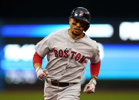 Mookie Betts #50 of the Boston Red Sox San Diego Padres trade rumors. (Photo by Vaughn Ridley/Getty Images)