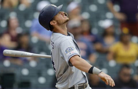 DENVER, CO – SEPTEMBER 15: Wil  Myers #4 of the San Diego Padres watches his fly out in the ninth inning against the Colorado Rockies at Coors Field on September 15, 2019 in Denver, Colorado. Colorado won 10-5. (Photo by Joe Mahoney/Getty Images)