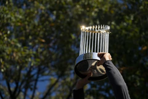 Ryan Zimmerman #11 of the Washington Nationals holds up the Commissioner’s Trophy. (Photo by Patrick McDermott/Getty Images)