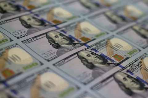 WASHINGTON, DC – MAY 20: Newly redesigned $100 notes. (Photo by Mark Wilson/Getty Images)