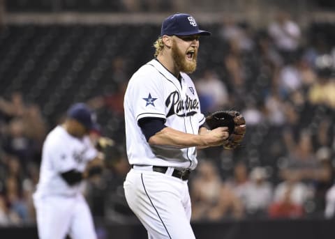 SAN DIEGO, CA – SEPTEMBER 15: Andrew Cashner #34 of the San Diego Padres reacts after getting an out in the ninth inning of a baseball game against the Philadelphia Phillies at Petco Park September, 15, 2014 in San Diego, California. The Padres won 1-0. (Photo by Denis Poroy/Getty Images)