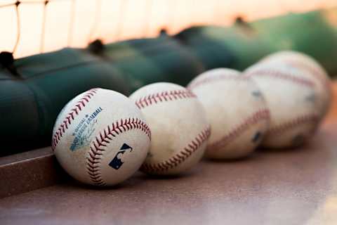 ST. LOUIS, MO – APRIL 25: Baseballs sit in the St. Louis Cardinals dugout prior to a game between the Pittsburgh Pirates and the St. Louis Cardinals at Busch Stadium on April 25, 2014 in St. Louis, Missouri. (Photo by David Welker/Getty Images)