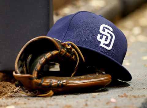 MILWAUKEE, WI – MAY 13: A San Diego Padres hat sits in the dugout during the game against the Milwaukee Brewers at Miller Park on May 13, 2016 in Milwaukee, Wisconsin. (Photo by Dylan Buell/Getty Images)