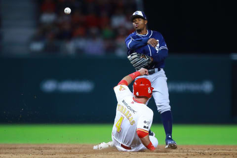 MEXICO CITY, MEXICO – MARCH 23: Xavier  Edwards of San Diego Padres tagged out in second base Ivan Terrazas of Diablos Rojos in the 2nd inning during a friendly game between San Diego Padres and Diablos Rojos at Alfredo Harp Helu Stadium on March 23, 2019 in Mexico City, Mexico. The game is held as part of the opening celebrations of the Alfredo Harp Helu Stadium, now the newest in Mexico to play baseball. (Photo by Hector Vivas/Getty Images)