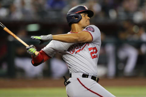 PHOENIX, ARIZONA – JULY 23: Right fielder Juan Soto #22 of the Washington Nationals swings during the MLB game against the Arizona Diamondbacks at Chase Field on July 23, 2022 in Phoenix, Arizona. (Photo by Rebecca Noble/Getty Images)