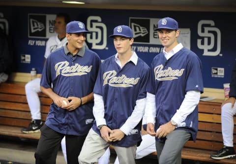 SAN DIEGO, CA – SEPTEMBER 10: Draft picks (L-R) Zach Eflin, Max Fried, and Walker Weickel of the San Diego Padres wait before throwing out the ceremonial first pitch before a baseball game against the St. Louis Cardinals at Petco Park on September 10, 2012 in San Diego, California. (Photo by Denis Poroy/Getty Images)